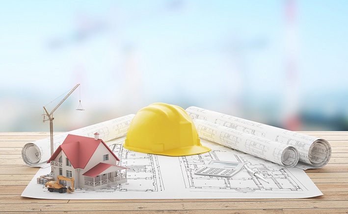 Construction-building-blueprints-crane-hardhat