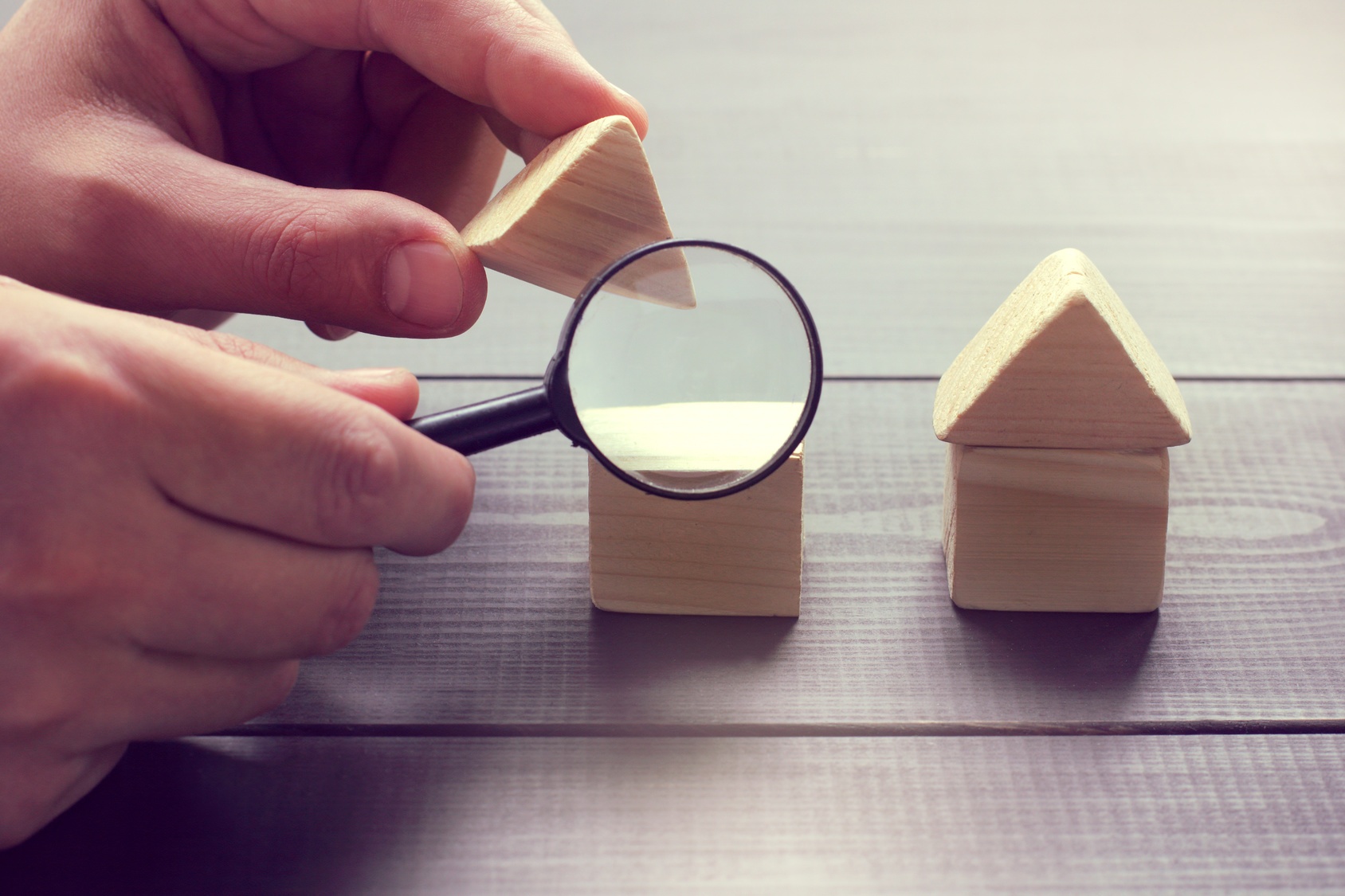 Magnifying wooden toy houses