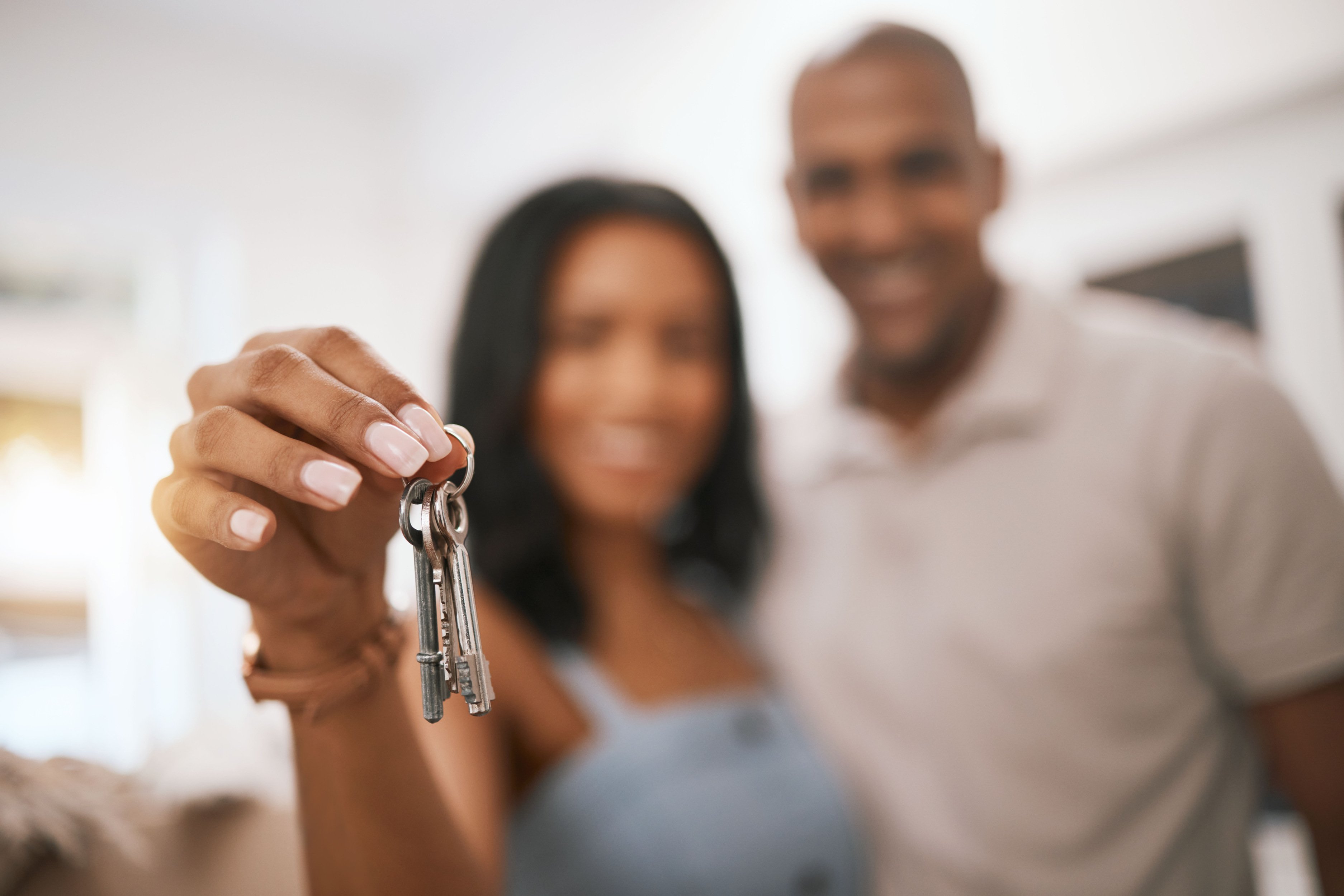 happy-couple-hands-keys-real-estate-purchase-property-homeowner-with-mortgage-loan-finance-hand-woman-man-realtor-holding-key-house-moving-sale-new-home-investment