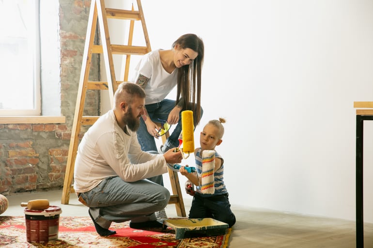 young-couple-family-doing-apartment-repair-together-themselves-mother-father-son-doing-home-makeover-renovation-concept-relations-moving-love-preparing-wall-wallpaper